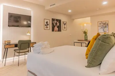 Cama o camas de una habitación en Luxurious Studio Madrid Centro TEMPORAL PDD2915