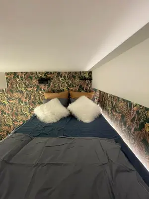 Cama o camas de una habitación en Corazón de Malasaña