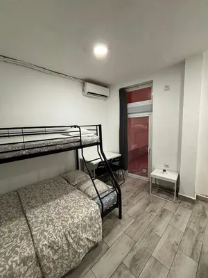 Cama o camas de una habitación en VR20I Estudio Centro WIFI