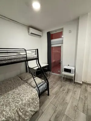Cama o camas de una habitación en VR20I Estudio Centro WIFI
