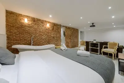 Cama o camas de una habitación en GuestReady - Lovely home in the Chueca area