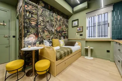 Cama o camas de una habitación en GuestReady - Homely stay in Madrid