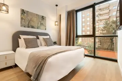 Cama o camas de una habitación en Catalina en Madrid