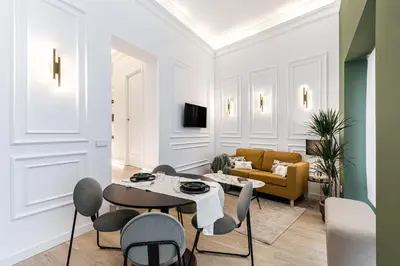 Zona de estar de Queen's Chamberí Boutique II - Alojamiento Corta Estancia