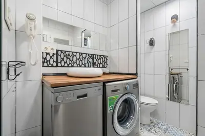 Una cocina o zona de cocina en Cosy loft in the centre of Madrid - Reloj D