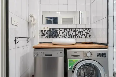 Una cocina o zona de cocina en Cosy loft in the centre of Madrid - Reloj D