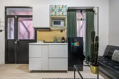 Una cocina o zona de cocina en Cosy loft in the centre of Madrid - Reloj D