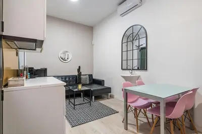 Una cocina o zona de cocina en Cosy loft in the centre of Madrid - Reloj D