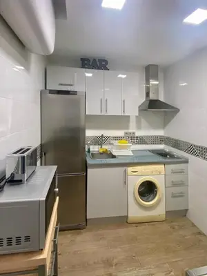 Una cocina o zona de cocina en Petit Loft toledo door - Casilda