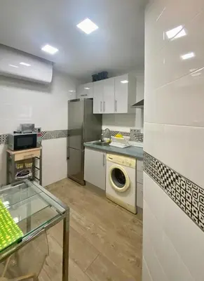 Una cocina o zona de cocina en Petit Loft toledo door - Casilda