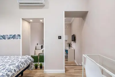 Cama o camas de una habitación en Modern studio near Gran Vía and key places - Reloj I