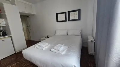 Cama o camas de una habitación en Estudio en Gran Via centro