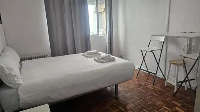 Cama o camas de una habitación en Estudio en Gran Via centro