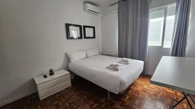 Cama o camas de una habitación en Estudio en Gran Via centro