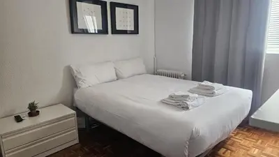 Cama o camas de una habitación en Estudio en Gran Via centro