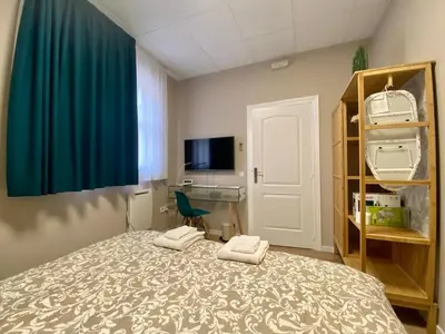 Cama o camas de una habitación en Entire Apartment in the center - 10 pax