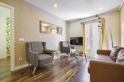 Una televisión o centro de entretenimiento en Apartamento Temporal Sol