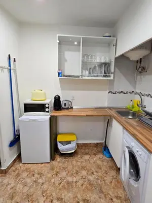 Una cocina o zona de cocina en Apartamentos EconoStay Sol