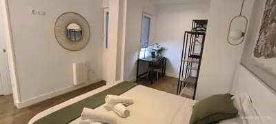 Cama o camas de una habitación en El Mirador de El Retiro