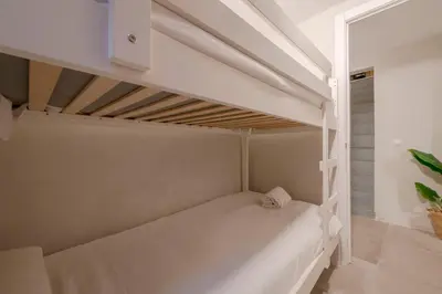 Cama o camas de una habitación en Rustic Cool Interior Design en Plaza España al pie de Gran Vía