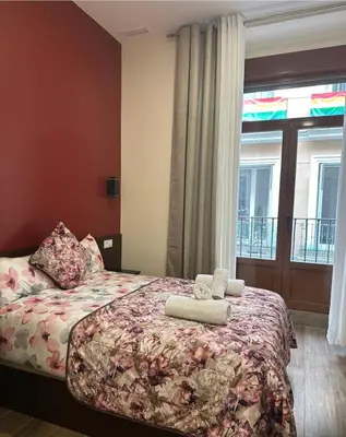 Cama o camas de una habitación en Hostal Corazón de Madrid 2