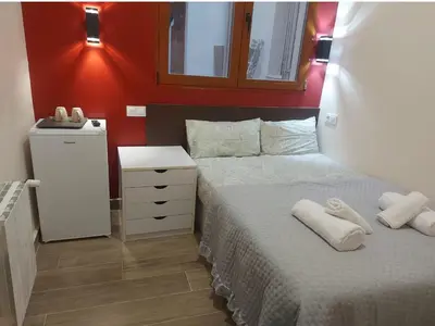 Cama o camas de una habitación en Hostal Corazón de Madrid 2