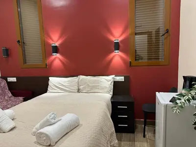 Cama o camas de una habitación en Hostal Corazón de Madrid 2