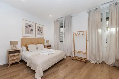 Cama o camas de una habitación en Hogar Malasaña II