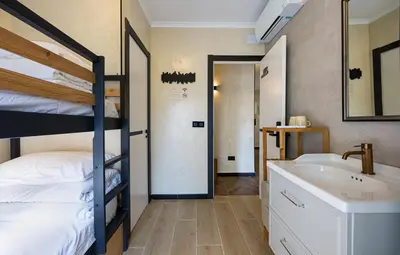 Cama o camas de una habitación en The Raimundo