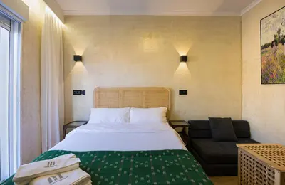 Cama o camas de una habitación en The Raimundo