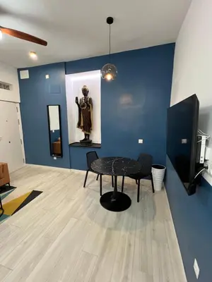 Una televisión o centro de entretenimiento en Nuevo Loft junto a Gran Vía