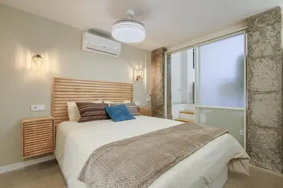 Cama o camas de una habitación en Beautiful apartment in the center surrounded by parks