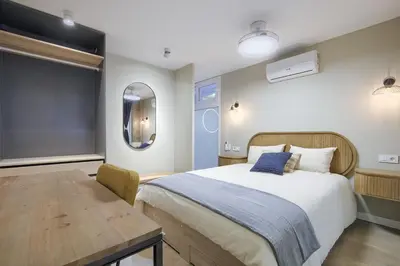 Cama o camas de una habitación en Beautiful apartment in the center surrounded by parks