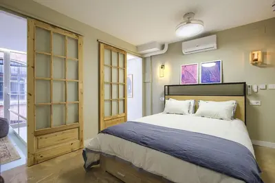 Cama o camas de una habitación en Beautiful central duplex apartment