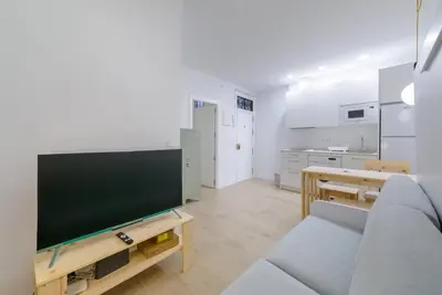 Una televisión o centro de entretenimiento en GuestReady - Lovely home in Lavapiés