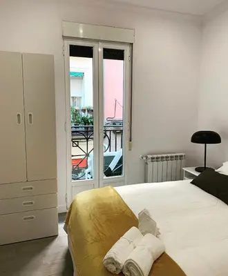 Cama o camas de una habitación en Modern Apartment I in Madrid