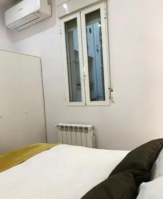 Cama o camas de una habitación en Modern Apartment I in Madrid