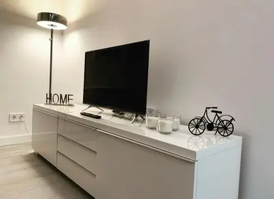 Una televisión o centro de entretenimiento en Modern Apartment I in Madrid
