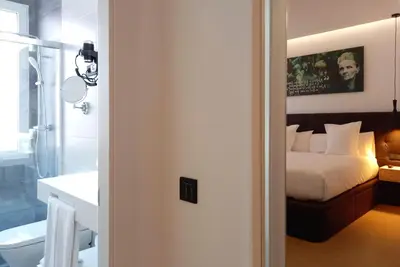 Cama o camas de una habitación en Woohoo Rooms Unique Madrid