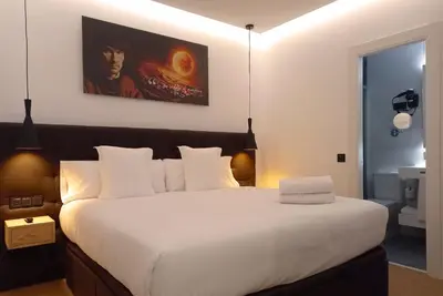 Cama o camas de una habitación en Woohoo Rooms Unique Madrid