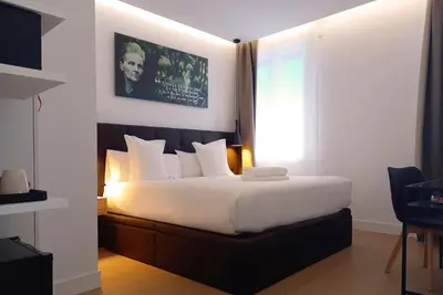 Cama o camas de una habitación en Woohoo Rooms Unique Madrid