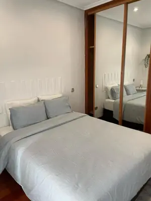 Cama o camas de una habitación en Exyca Homes Gran Vía