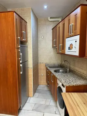 Una cocina o zona de cocina en Exyca Homes Gran Vía
