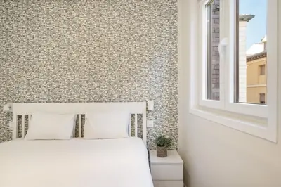 Cama o camas de una habitación en Modern, brand-new apartment for 4 in Las Letras - Huertas