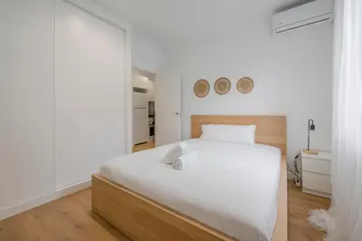 Cama o camas de una habitación en Retiro con parking para 4, vive la Latina