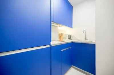 Una cocina o zona de cocina en Iconic Suites