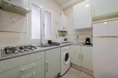 Una cocina o zona de cocina en Warm Apartment in Salamanca