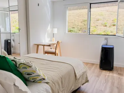 Cama o camas de una habitación en Madrid Puerta de Toledo en el centro de la ciudad Apartamento moderno en Madrid ideal para estancias corporativas y media estancia 15 días o mas Espacios amplios y confortables