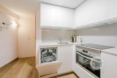 Una cocina o zona de cocina en Central Apartments en Plaza Mayor