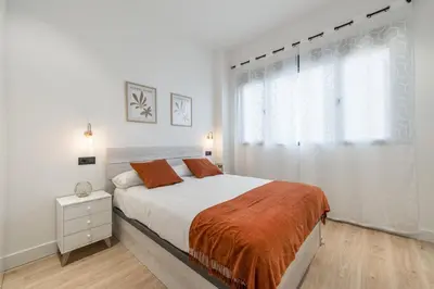 Cama o camas de una habitación en Acogedor Apartamento en Azca QA